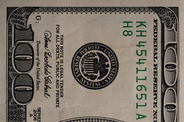 A fragment of a bill of 100 US dollars.