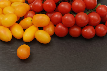 tomatoes on black background
