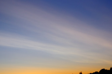 Sunrise in the countryside. A day dawns. The orange contrast of the sun with the darkness of dawn. It makes this landscape something beautiful. The black melts with the sun