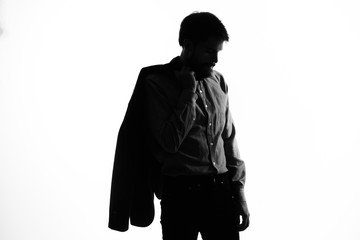 silhouette of a man in black suit