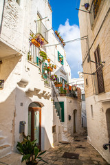 Typical alley in beautiful small town of Cisternino, Apulia, South Italy