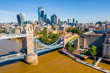 Tower Bridge in London, the UK. Sunset with beautiful clouds. Drawbridge opening. One of English...
