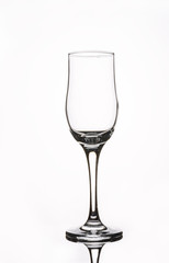 glass seklyany empty gloomy on a light background with reflection
