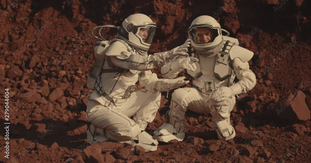 Canvas Prints astronauts collecting rock samples on mars
