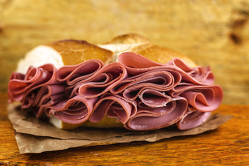 bread with mortadella typical of Brazil. Bakery snack. Snack made at the municipal market of the city of São Paulo.