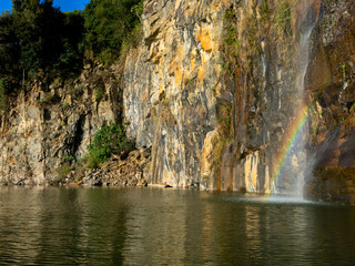 Rock cliff on Jaguari dam - rainbow