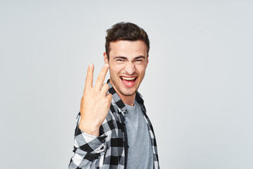 Fototapeta premium young man talking on the phone isolated on white