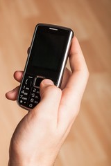 Person holding a cell phone