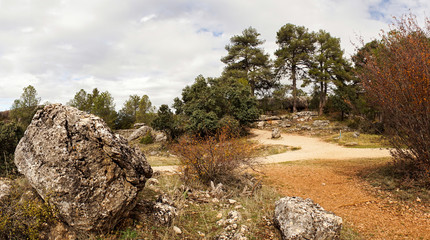 Fototapeta na wymiar La Ciudad encantada. The enchanted city natural park, group of crapicious forms limestone rocks in Cuenca, Castilla la Macha, Spain. 