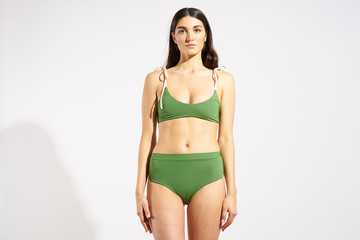 Obraz premium young woman in green bikini