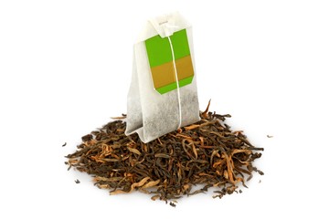 Bag of tea on top of tea leaves