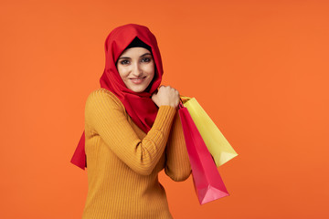 young woman with shopping bags