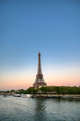 Obraz na płótnie Canvas The Eiffel Tower across the River Seine in Paris, France.