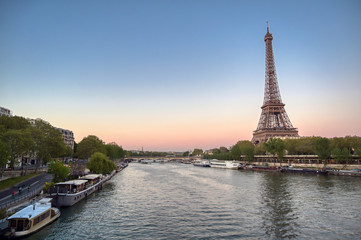 Fototapeta premium The Eiffel Tower across the River Seine in Paris, France.
