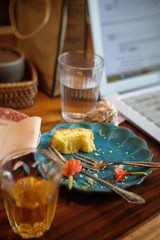 glass of water and pills on wooden table
