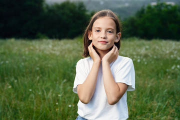 young smiling woman with perfect skin on face looking at camera