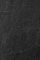 Dark grey black slate background or texture.