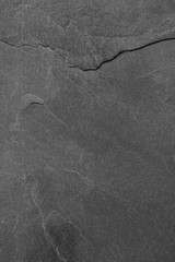 Dark grey black slate background or texture.