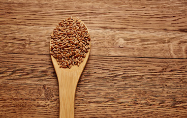 wooden spoon with sesame seeds