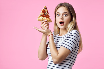 Beautiful woman pizza in hands