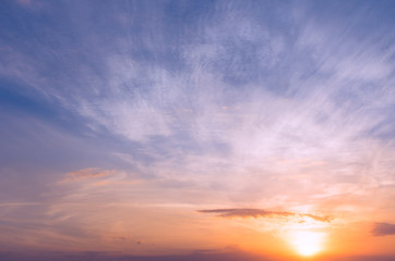 Fototapeta na wymiar Soft sunshine at sunset and cirrus clouds.
