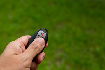 Car remote control on green