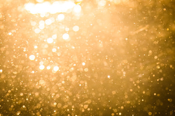 Abstract gold bokeh with black