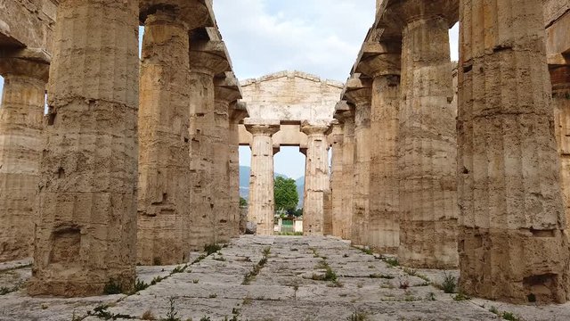 Moving shot inside an Ancient Greek temple in Paestum Italy