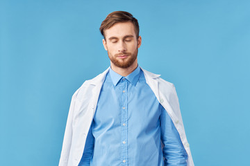 portrait of a young man with arms crossed