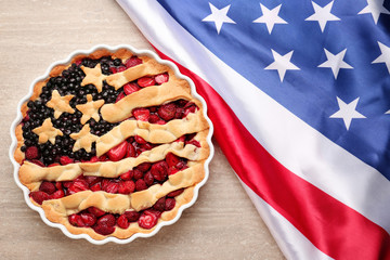 Tasty American flag pie on table