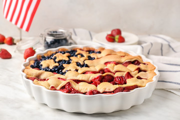 Tasty American flag pie on table