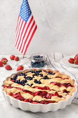 Tasty American flag pie on table