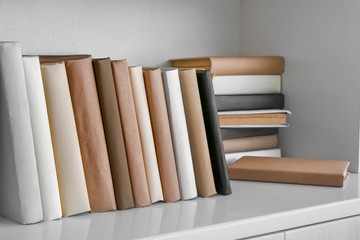 Many different books on shelf