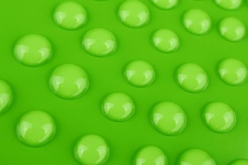 Green drop. Round water drops set on green background. Drops pattern.Ecology, nature and environment. Abstract water background.Water Drops on Green Surface