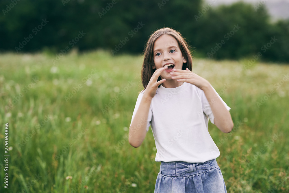 Wall mural young woman talking on cell phone