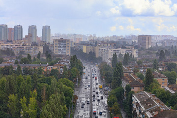 Fototapeta premium Torrential rain over residential areas and streets of the old city.