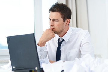 businessman working on laptop in office