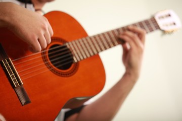 Man playing an acoustic guitar