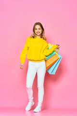 young woman with shopping bags