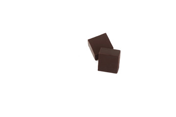 dark chocolate candy isolated on white background.