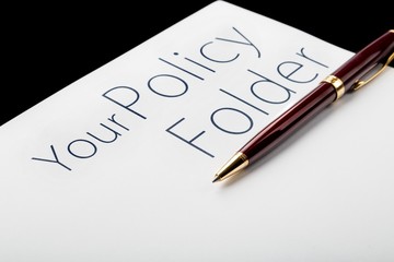 Insurance Policy with a pen