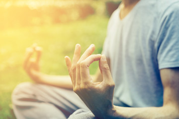 Meditation man's hands yoga gestur  in nature. Yoga fingers