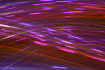 Abstract  lines of energy lines of red and blue ectoplasm on a black background.