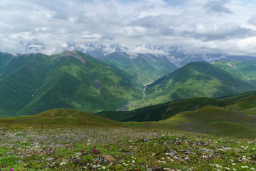 Fototapeta na wymiar View of the river valley with a mountain village, Georgia, Svaneti