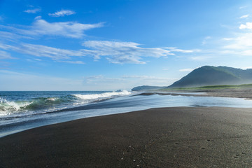 Black volcanic beach, Pacific Coast, Kamchatka, Russia