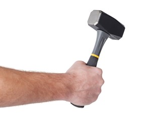 Hand Holding Hammer