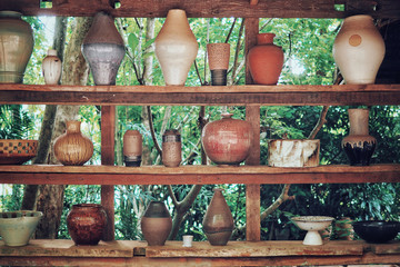 Fototapeta na wymiar Ceramic pottery in park in the morning.
