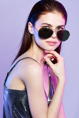 portrait of young woman in sunglasses