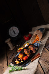 grilled chicken legs in barbecue marinade with sweet potatoes
