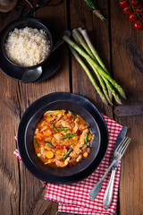 colorful turkey fricassee with asparagus and paprika